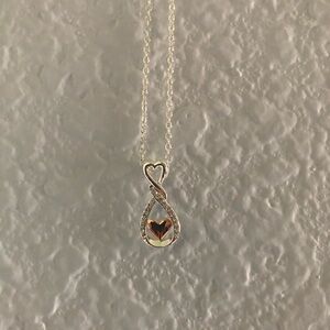 Silver and rose gold necklace with CZs.